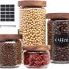 Amazon: $9.99 ($24.99) 4 Pack Glass Jars with Wood Lids with 20 Pantry Labels Preprinted and a Pen